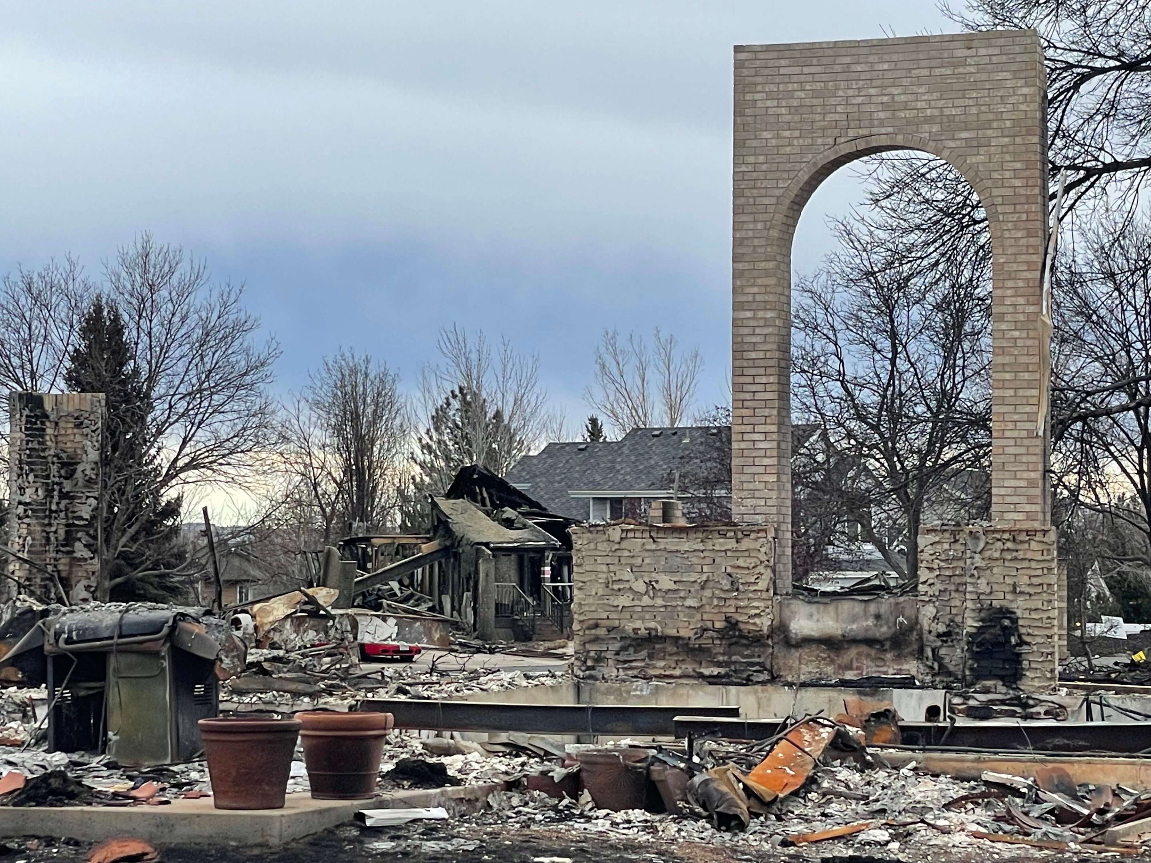 Remains of burned down home, brick archway only remains
